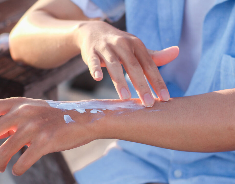 Man applying suncream